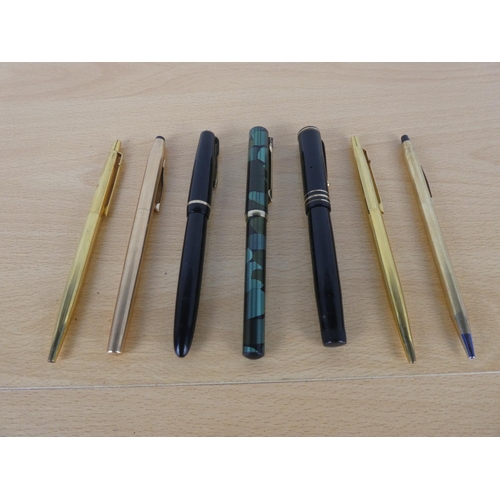 475 - A vintage Swan Leverless pen, a vintage Parker Victory pen and more.