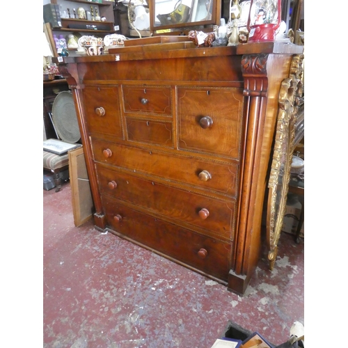 488 - A stunning antique Scotch chest with inlay and scroll detail.