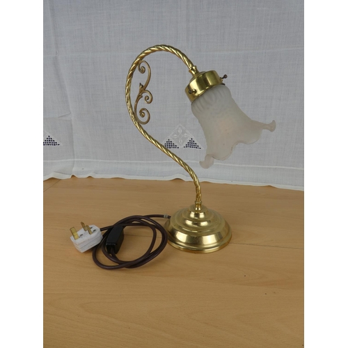 492 - A table lamp with glass shade.