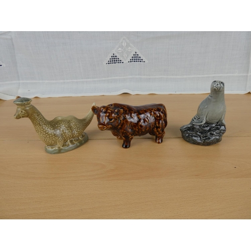 495 - A miniature whisky Decanter in the form of a bull and a Beswick Beneagles Scotch whisky miniature wh... 