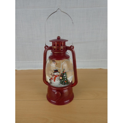 496 - A Christmas snow globe lantern.