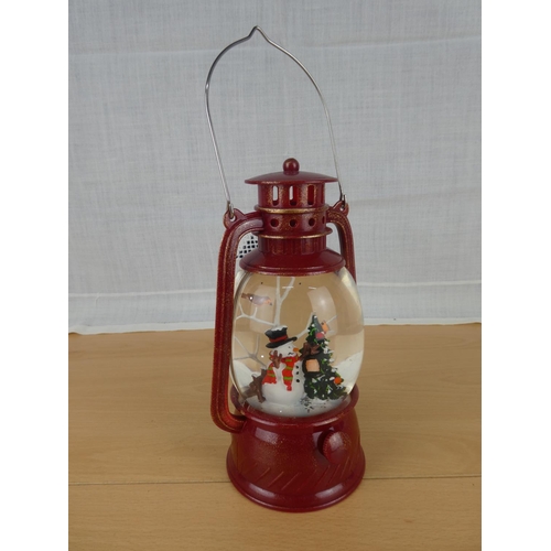 496 - A Christmas snow globe lantern.