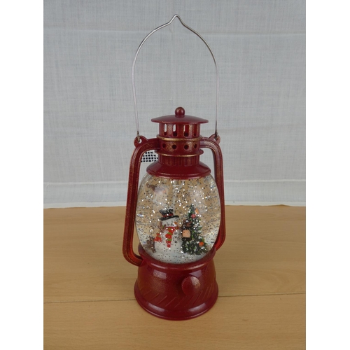 496 - A Christmas snow globe lantern.