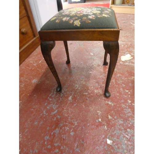 502 - A tapestry topped piano stool.