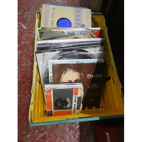 505 - A large assortment of records and albums.