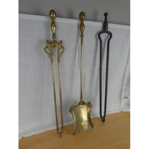 509 - A pair of Victorian brass fire irons and a pair of cottage iron tongs.