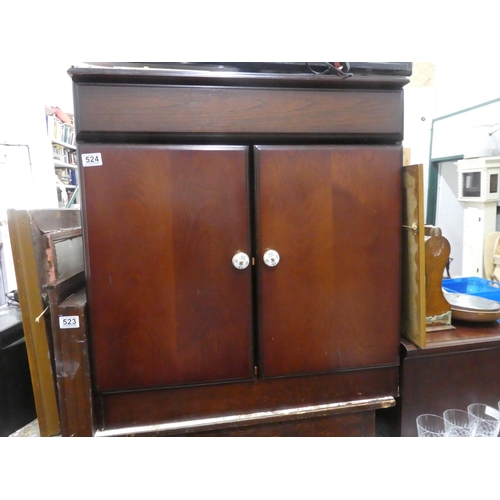 524 - A wooden cabinet.