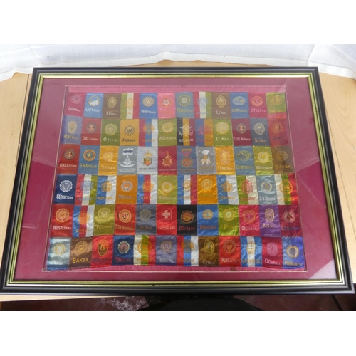 526 - An unusual framed collage of silk Mason's flags.