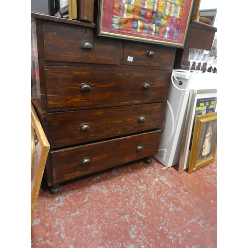 527 - An antique pine chest of five drawers.