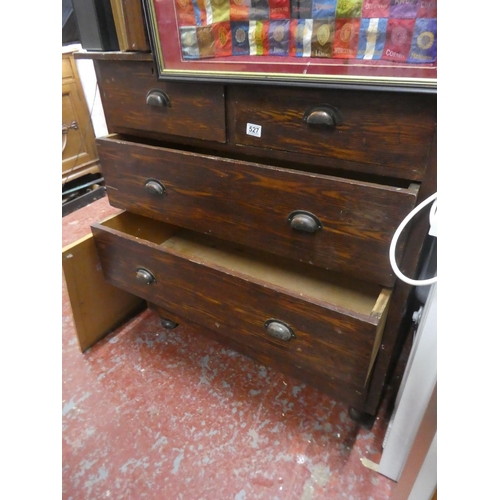 527 - An antique pine chest of five drawers.