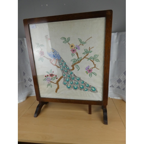 528 - A vintage needlework firescreen.