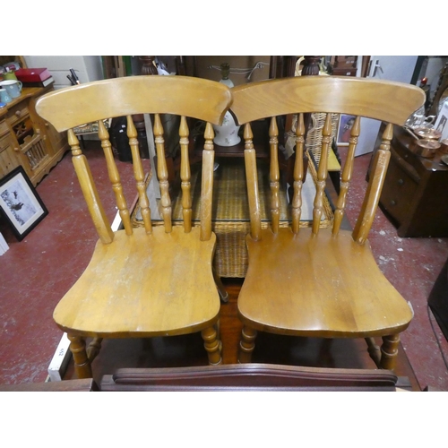 543 - A pair of kitchen chairs.