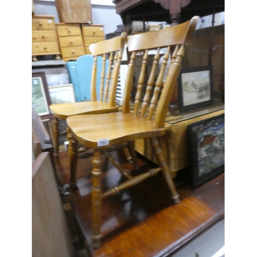 543 - A pair of kitchen chairs.