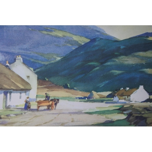 555 - A vintage framed print of Donegal Cottages signed.