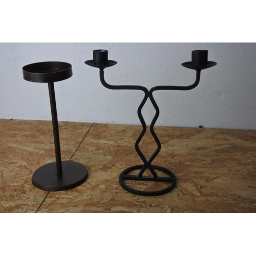 576 - Two candleholders.