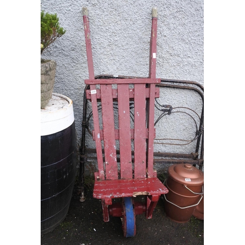 648 - A painted turf cart in need of restoration.