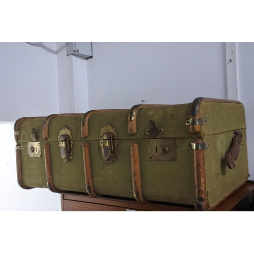 680 - A vintage travel trunk.