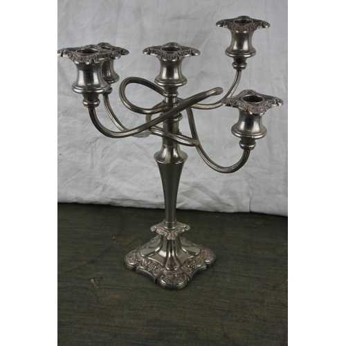 707 - A five branch silver plated candelabra.