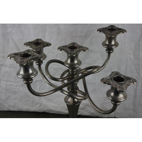 707 - A five branch silver plated candelabra.