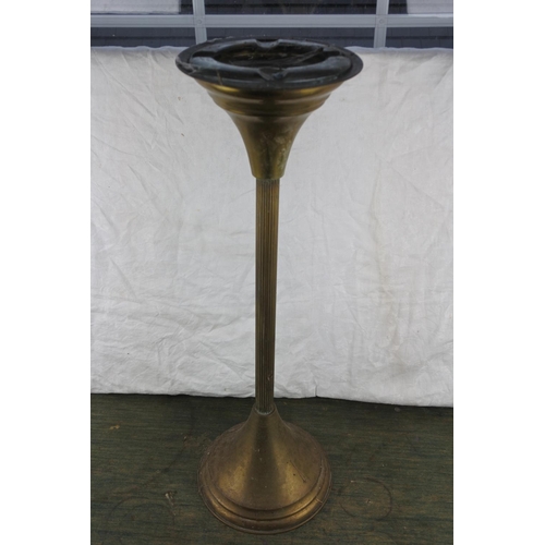 711 - A vintage brass ashtray stand and glass ashtray.