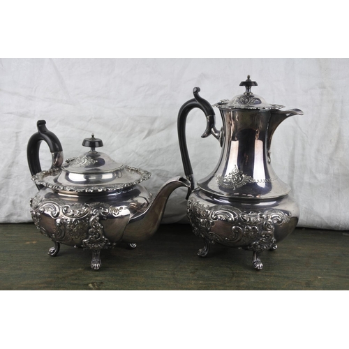 713 - An antique silver plated four piece tea service.