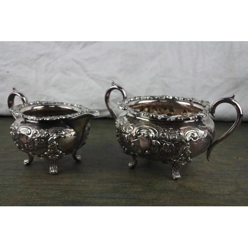 713 - An antique silver plated four piece tea service.