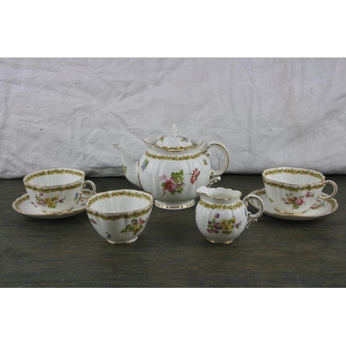 726 - A stunning seven piece tea service manufactured for Harrods Limited, London 'gold' pattern.