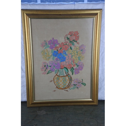 741 - A framed needlework picture.