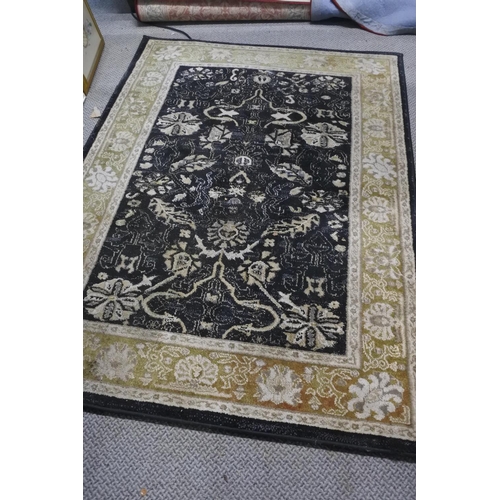 742 - A Ziegler pattern floor rug measuring 120 x 170.