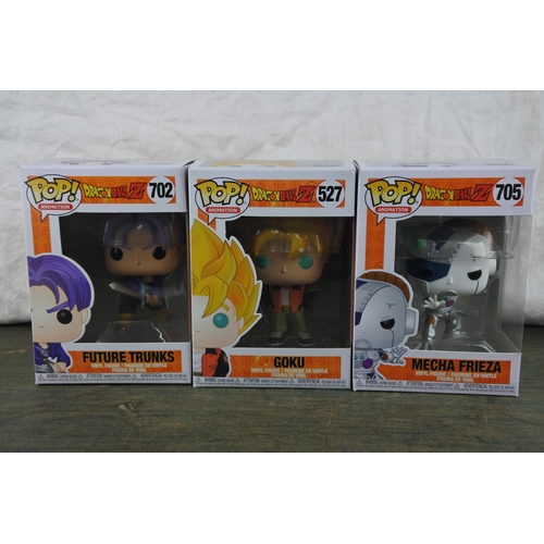 753 - Three boxed Marvel Pop Games characters 'Future Trunks, Goku and Mecha Frieza'.