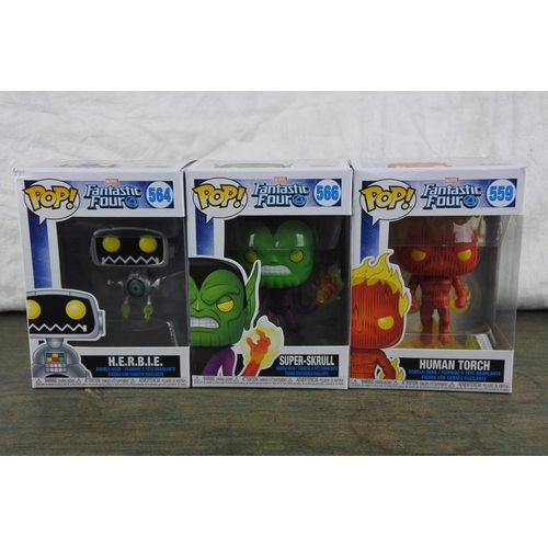 754 - Three boxed Marvel Pop Games characters 'H.E.R.B.I.E., Super-Skrull and Human Torch'.