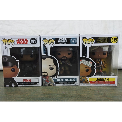 764 - Three boxed Marvel Pop Games characters 'Finn, Baze Malbus and Jannah'.