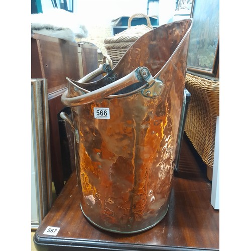 566 - A stunning large antique copper coal bucket.