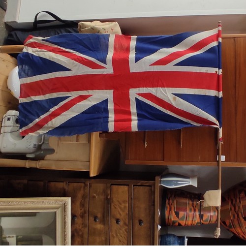 710 - A vintage union jack flag and pole.