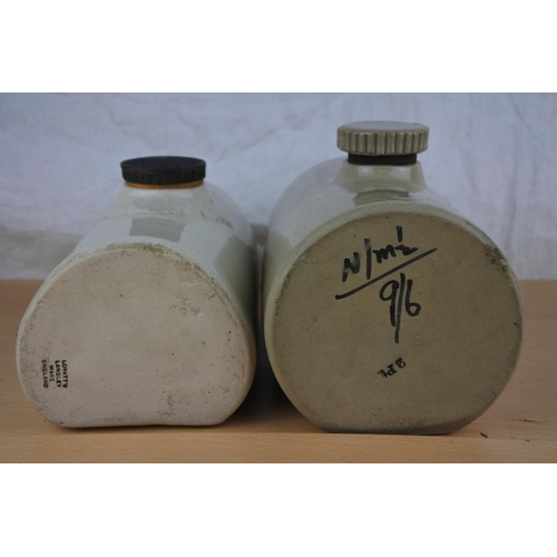54 - Two stoneware hot water bottles.