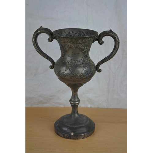 6 - A silver plated presentation cup.