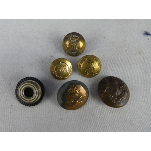 299 - An assortment of six British Military buttons to include a Crown and a Eagle RAF button and a Britis... 
