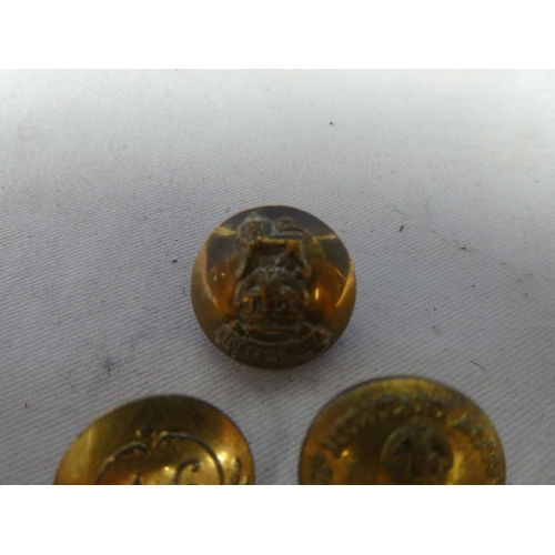 299 - An assortment of six British Military buttons to include a Crown and a Eagle RAF button and a Britis... 