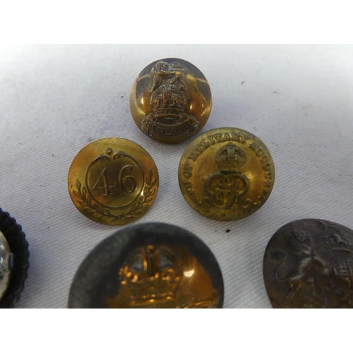 299 - An assortment of six British Military buttons to include a Crown and a Eagle RAF button and a Britis... 