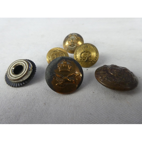 299 - An assortment of six British Military buttons to include a Crown and a Eagle RAF button and a Britis... 