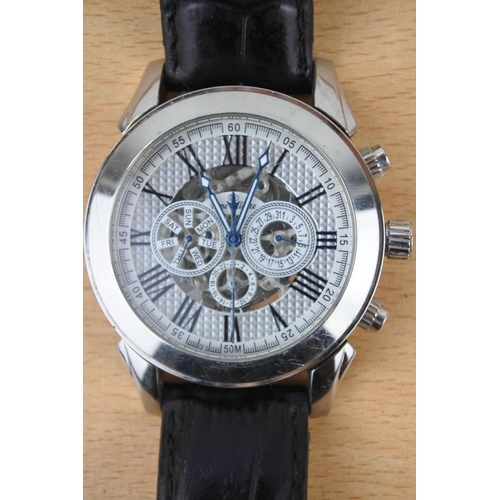 639 - A Gents Rene Valente TMG605 watch.