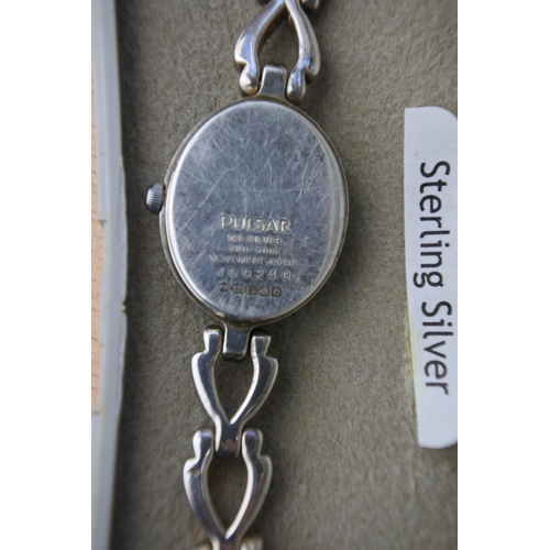 649 - A boxed sterling silver Pulsar watch.
