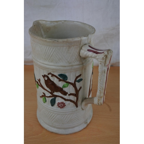 556 - A stunning antique spongeware jug with bird on a branch detail.