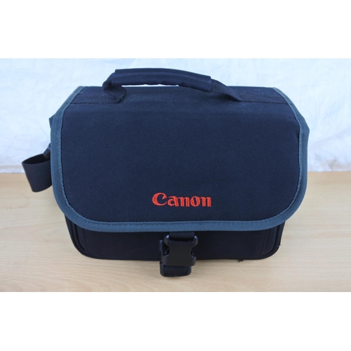 562 - A Canon camera bag containing a Minolta HI Matic F and case, a Fujica STX1 camera and a Pentax ME su... 
