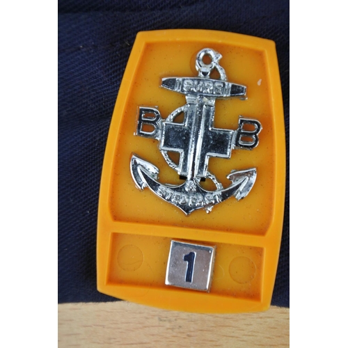 569 - A Boys Brigade cap and badges.