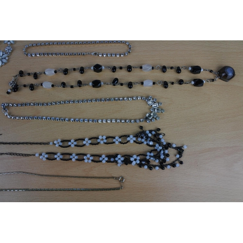 590 - An assortment of costume jewellery.