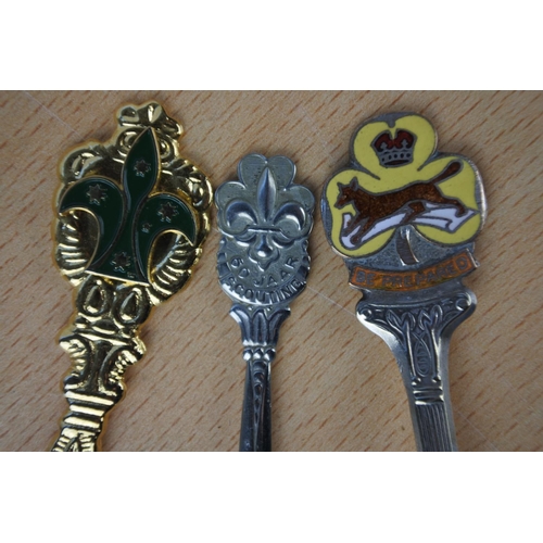 596 - A collection of seven Boy Scout EPNS spoons and more.