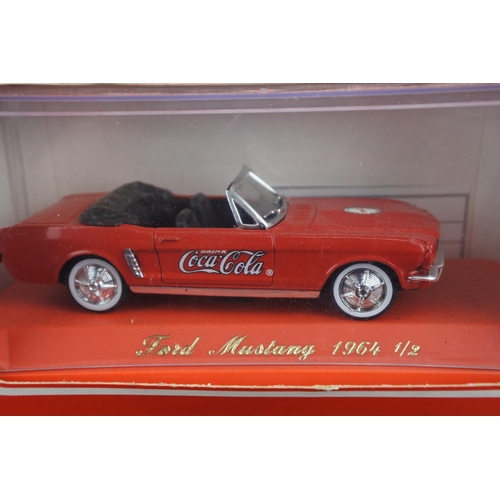 3 - Two boxed Coca Cola diecast vehicles, scale 1/43.
