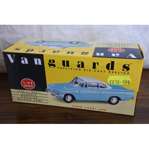 83 - Two boxed Van Guards VA34000 Ford Capri 109E scale 1:43 and Austin A40 van scale 1:43.