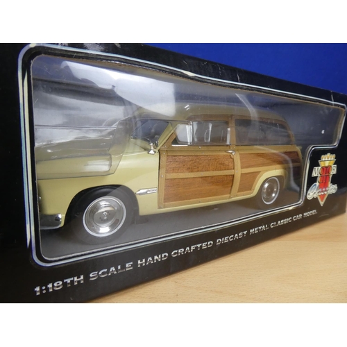 114 - A boxed Motor City Classics 1949 Ford Woody Wagon 3002 scale 1:18.